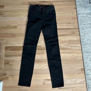 AE Super Stretch, low rise, skinny black jeans
